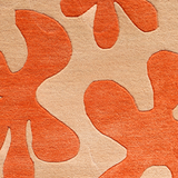 Orange modern wool rug with playful floral shapes, perfect for 6x9 or 5x8 rugs in fun spaces
