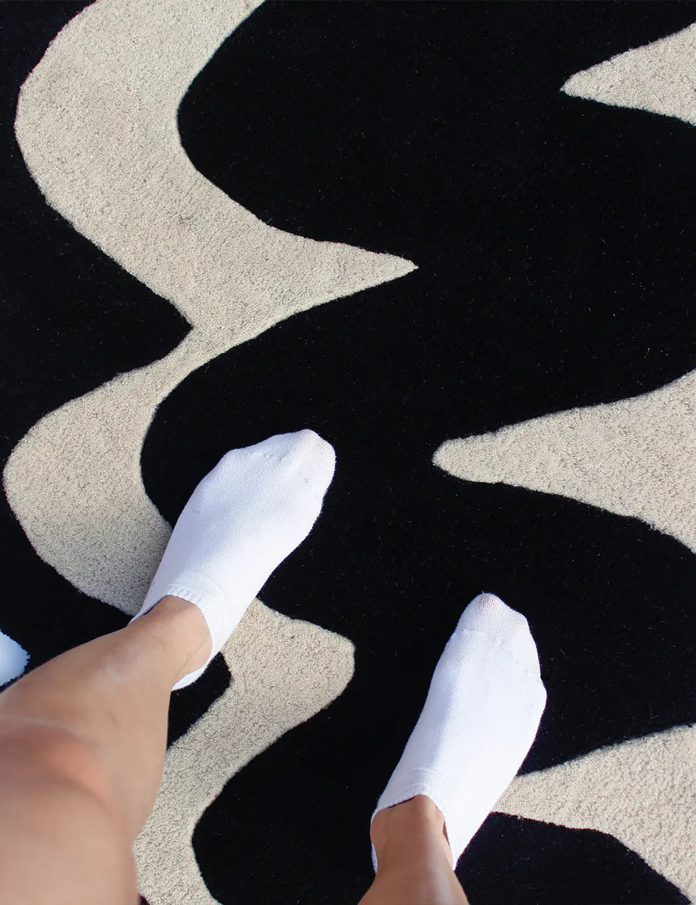 irregular black and white zig zag wool rug