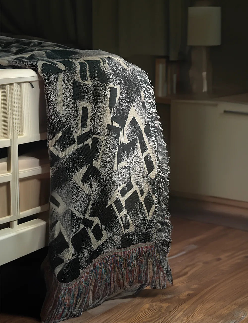 black modern graphic woven throw blanket with fringe