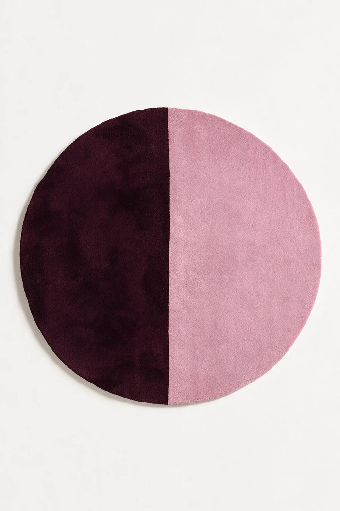 6x6 dusty plum and mauve wool circle rug, a modern choice for bedrooms, nurseries, and organic modern living spaces berry