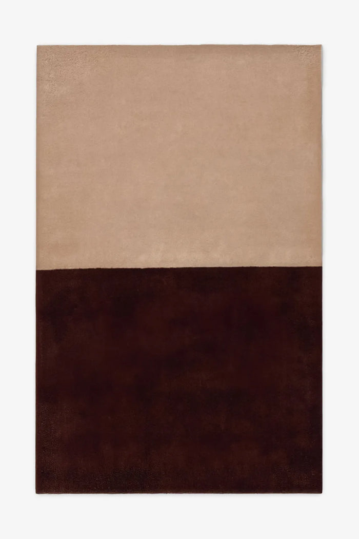 Soft neutral tan and deep brown wool rug, a warm modern addition to bedrooms, home offices, or cozy minimalist homes hazelnut