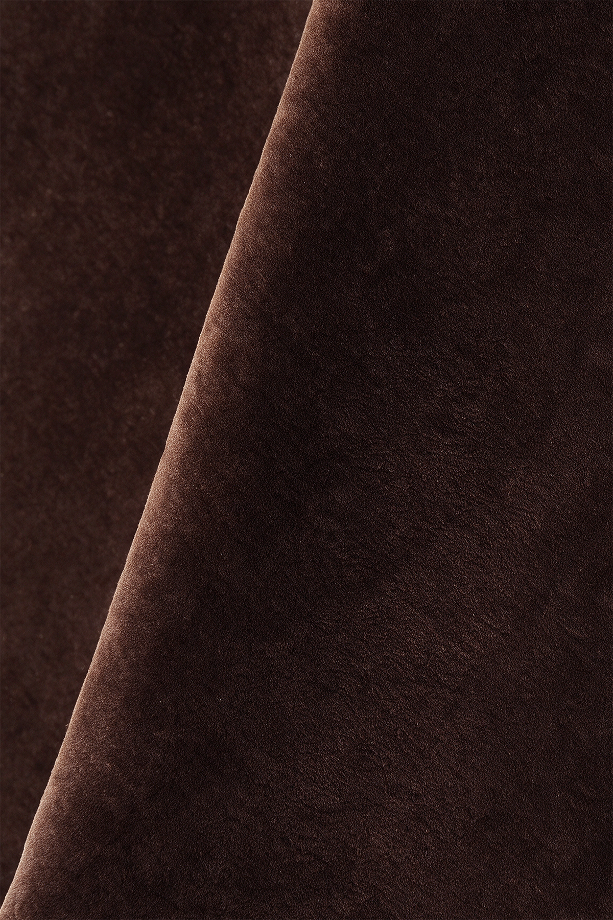 Close-up of dark chocolate brown wool rug