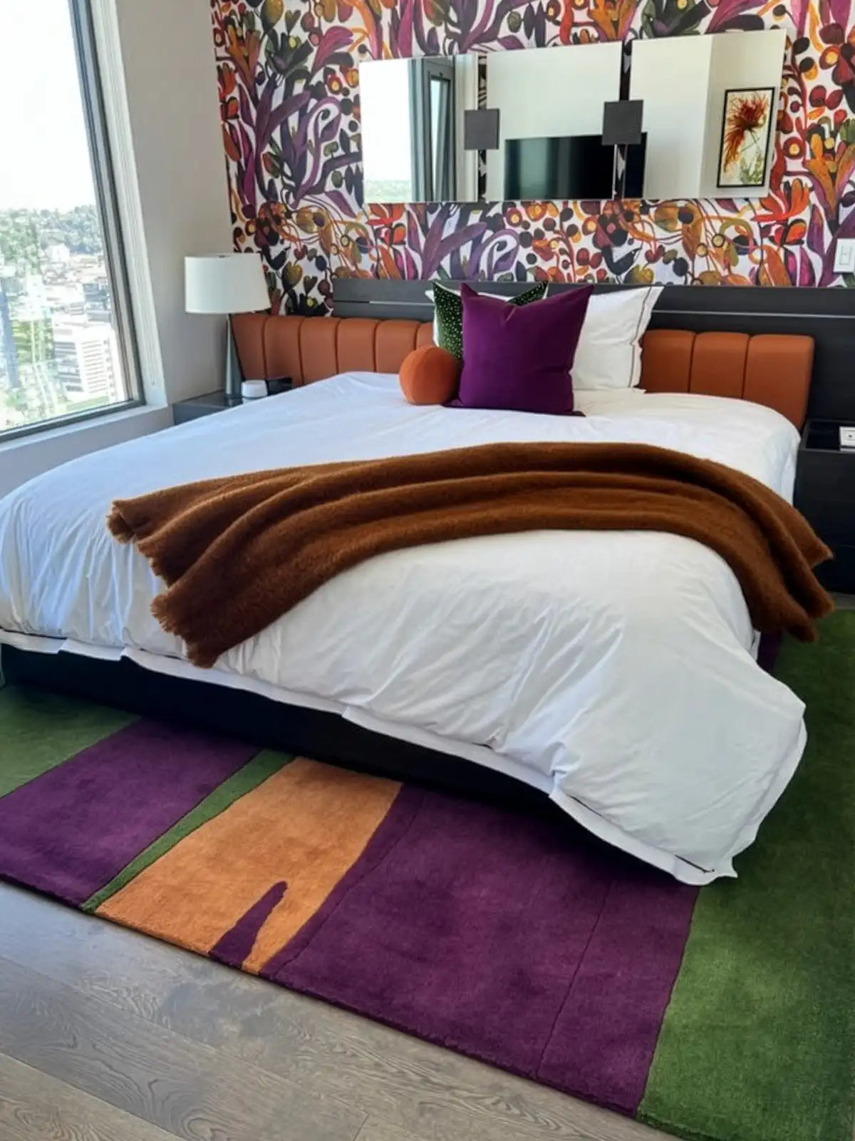 custom area rugs in wool with modern color palette and design in unique bedroom