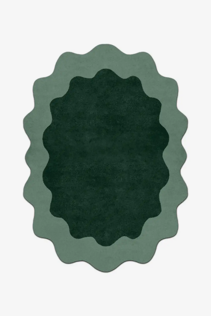unique green oval rug with sage scalloped border in custom sizes