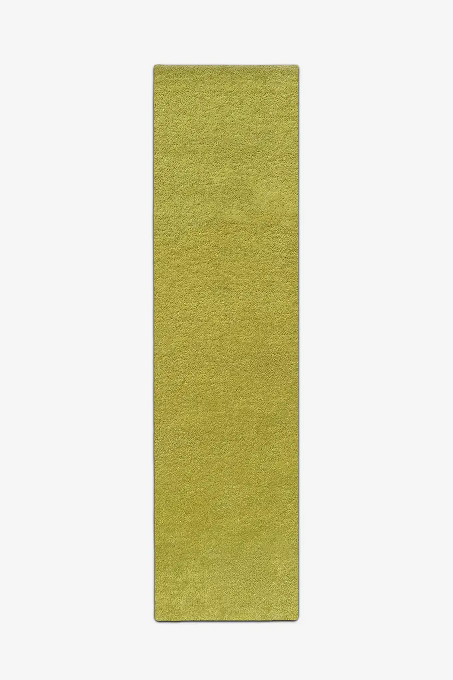 long lime green wool runner rug on a white background