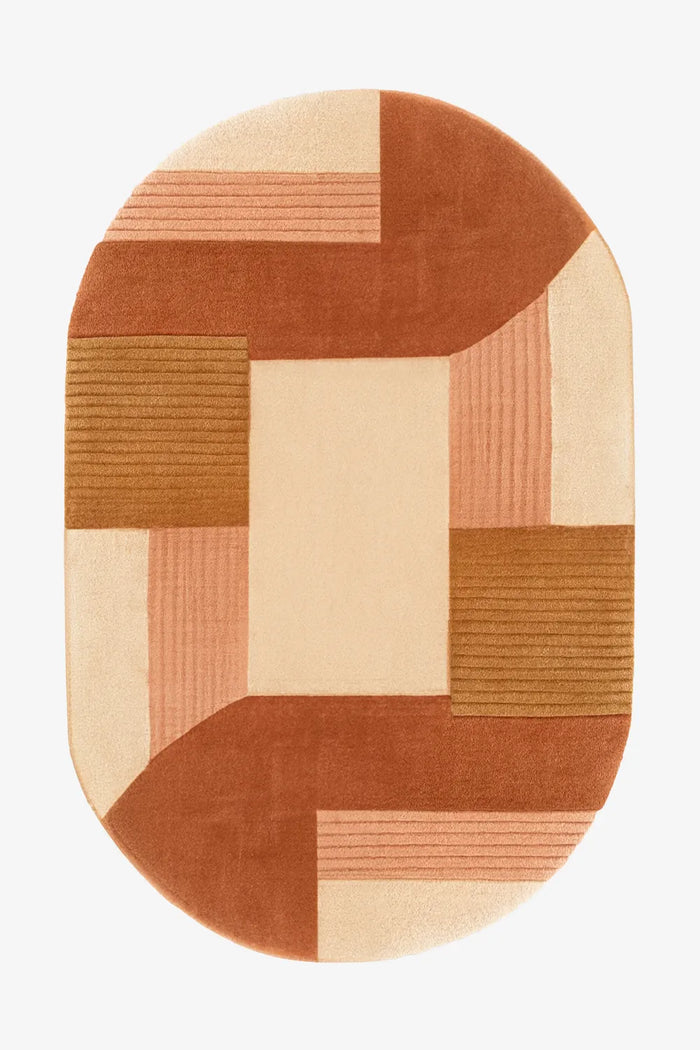 8x10 oval wool rug in terracotta, camel, and cream color blocks with hand-tufted modern geometric design