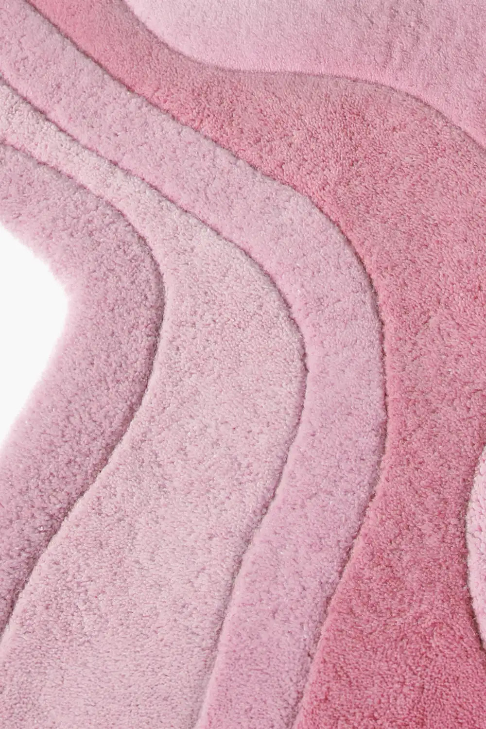 Modern hand-tufted pink wool rug with scalloped edge and rolling contour lines rose