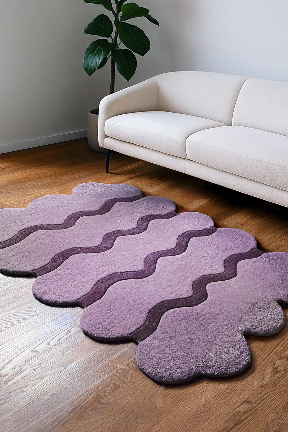 Boho purple wool ripple rug styled in bright living room, custom colorful rug lifestyle