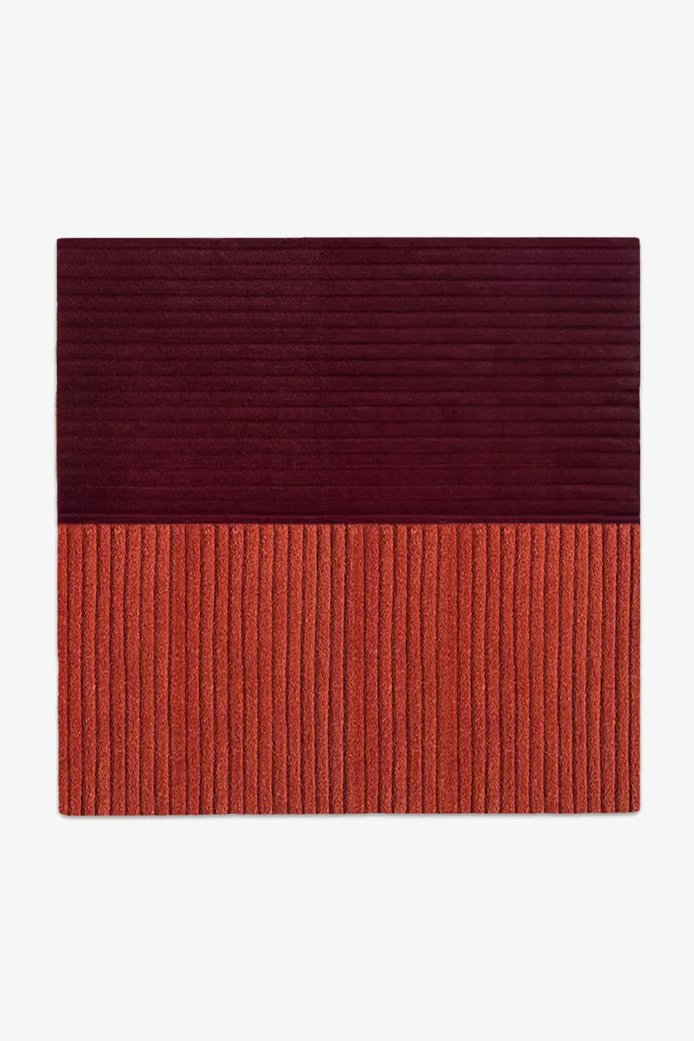Two-tone red and bunt orange square rug with a ribbed texture on a white background