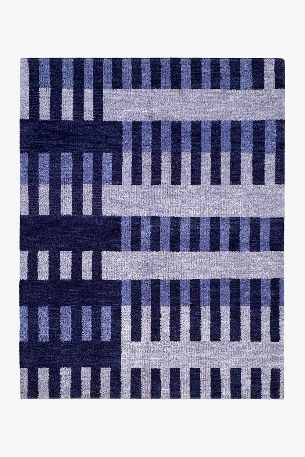wool area rug with blue and navy striped geometric pattern on a white background