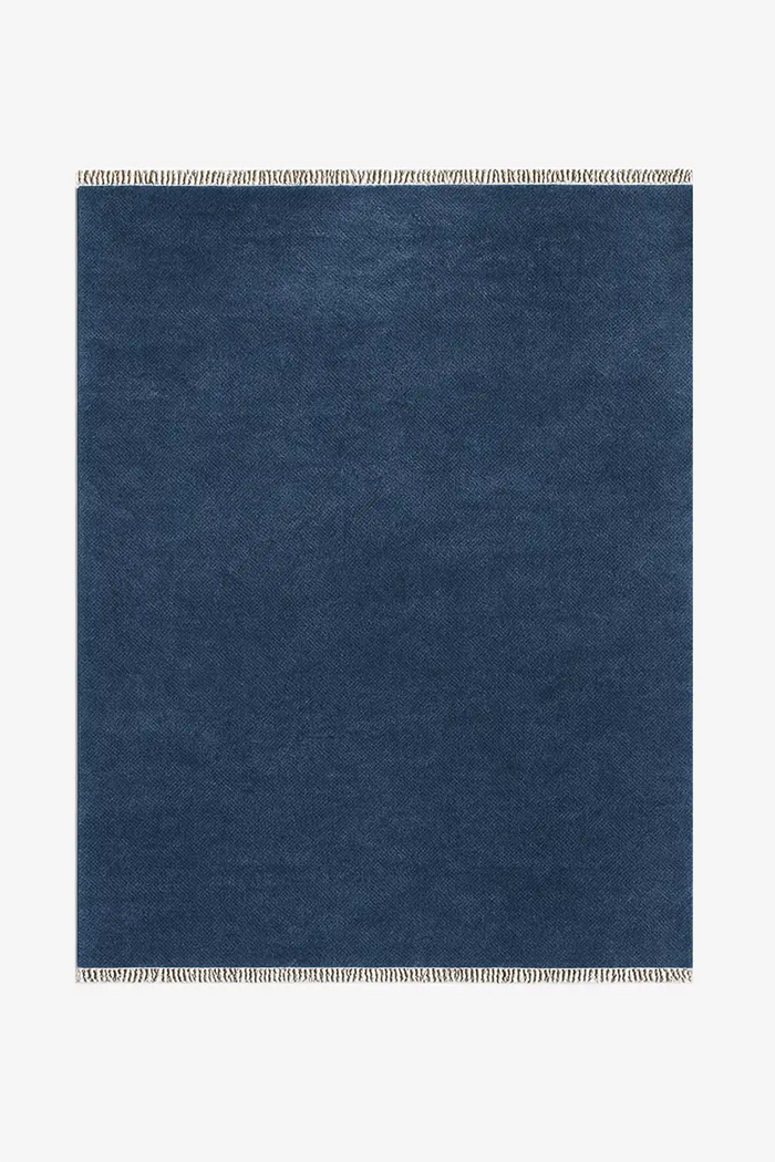 dark blue hand-knotted modern wool area rug in 8x10 on a white background