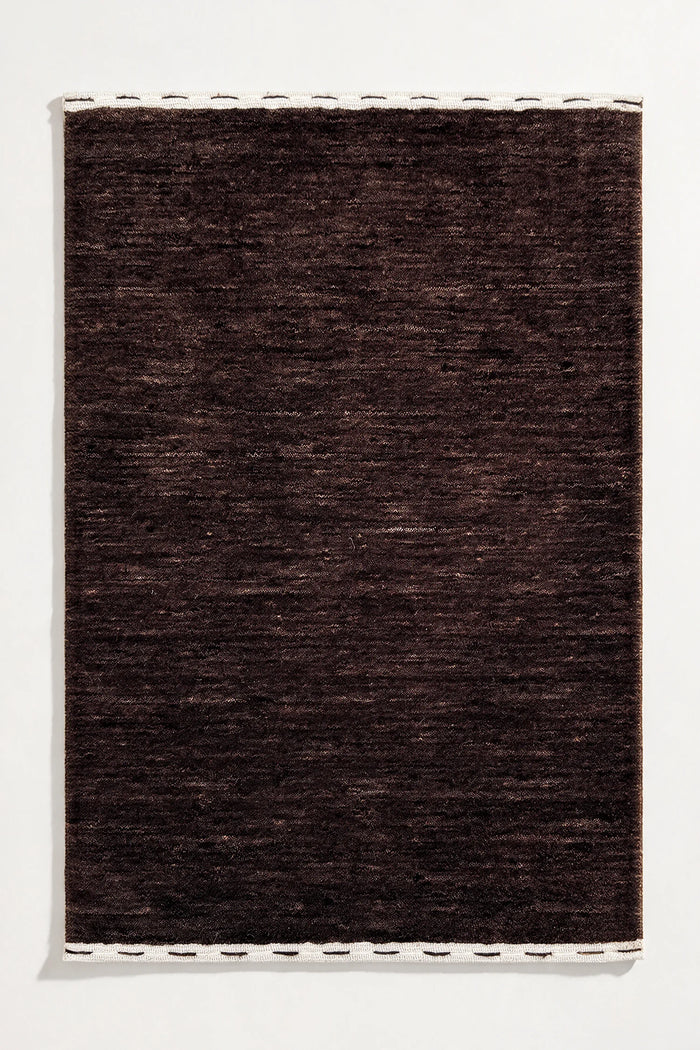 dark brown area rug hand-loomed wool | Haven in Cocoa with stitched binding