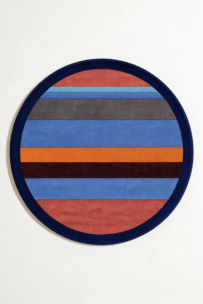 Round rug with multicolored stripes on a white background