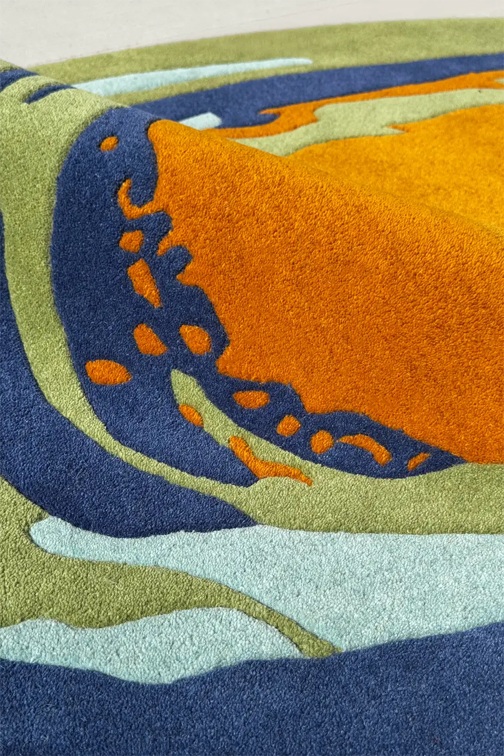 Modern abstract rug with multicolor curves in a fun shaped layout, ideal for kids’ spaces or coastal homes