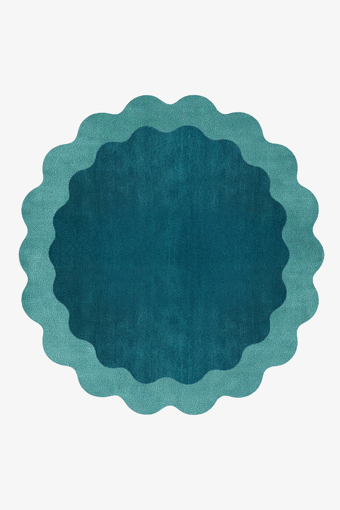Modern scalloped round rug in teal and turquoise wool, a bold 6 ft circular statement piece for colorful living rooms or unique bedrooms