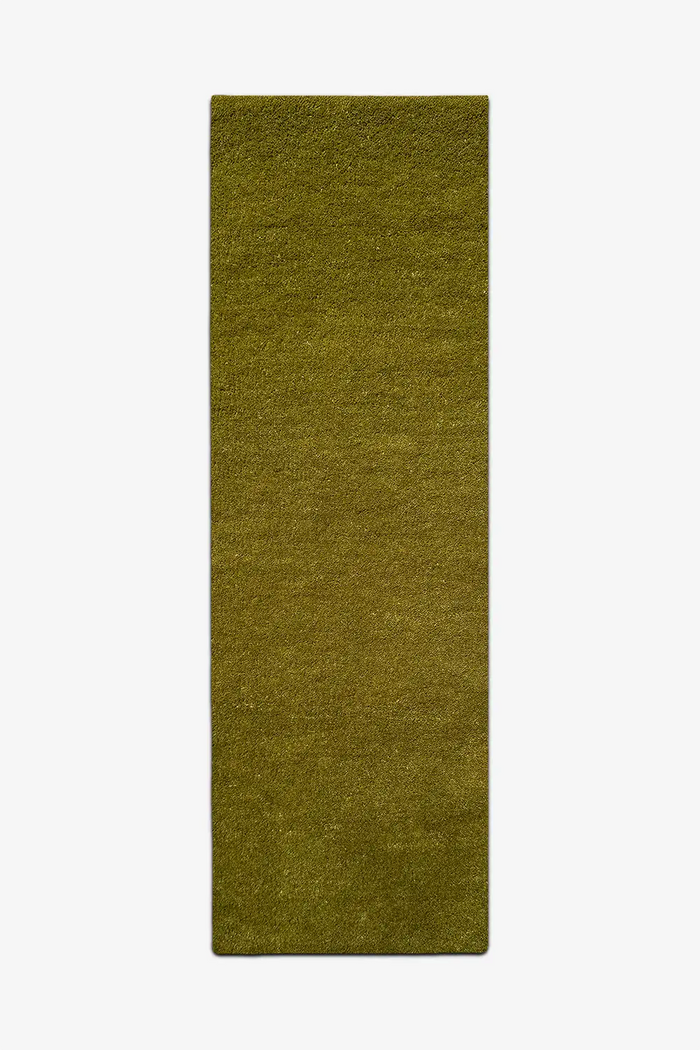 olive green wool runner rug on a white background, perfect for long hallways and entryways
