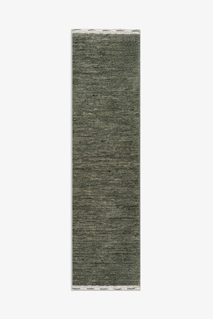 A long, narrow runner rug in a heathered sage green color, shown flat against a solid white background.