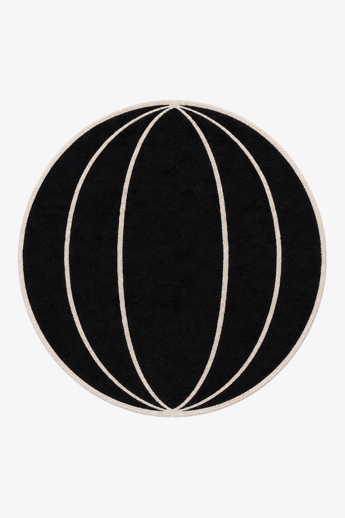black round rug with arched stripes in contemporary design
