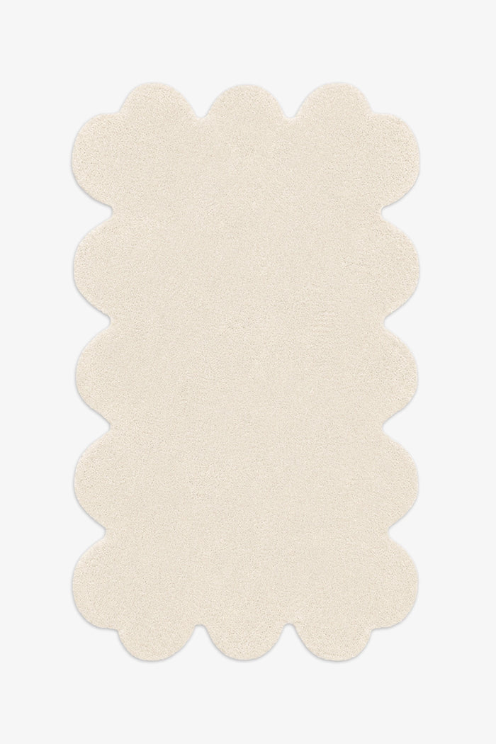 8x10 white scalloped wool rug with hand-tufted plush pile, perfect for modern minimalist living rooms