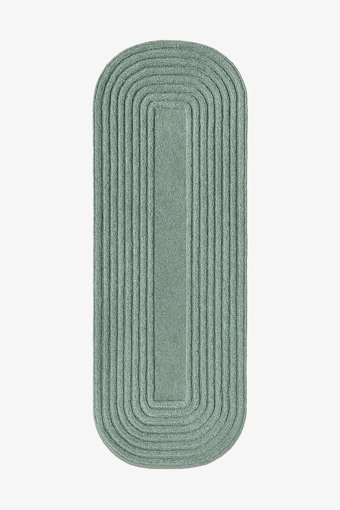 sage green wool runner rug with textured organic stripe pattern and rounded edges
