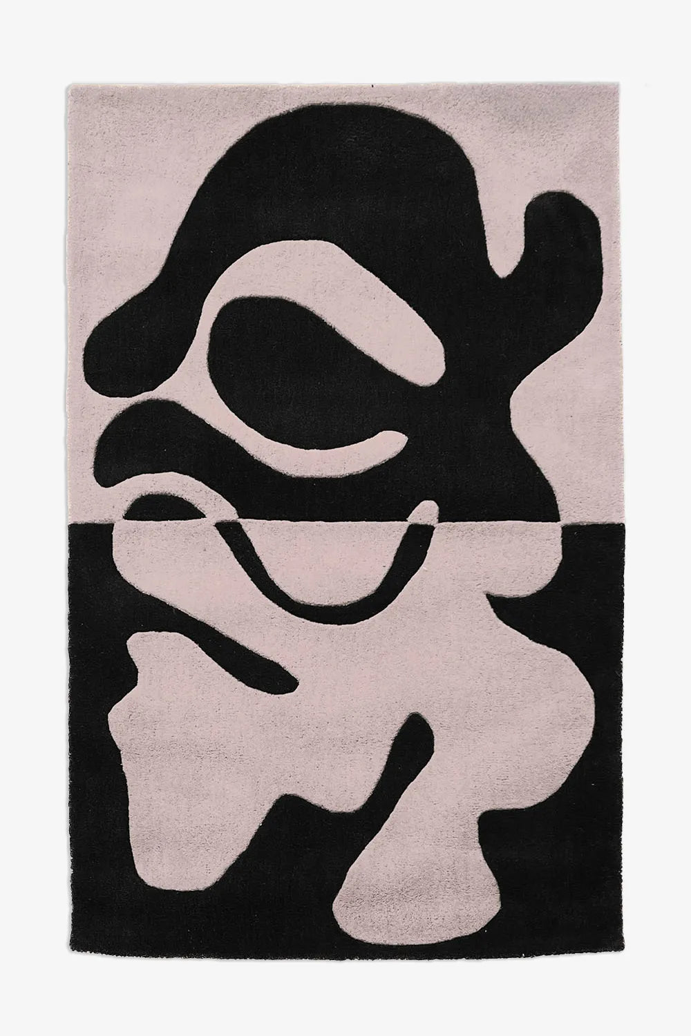Two-tone black and white abstract rug with organic tufted forms