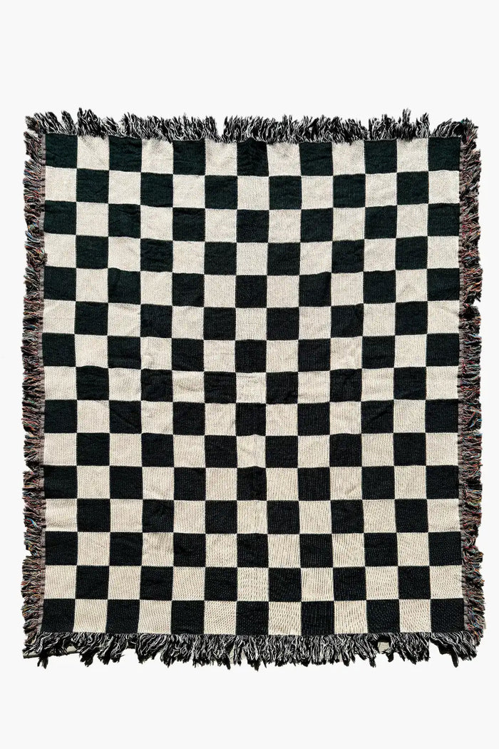 Black and white checkered woven throw blanket with a classic design.