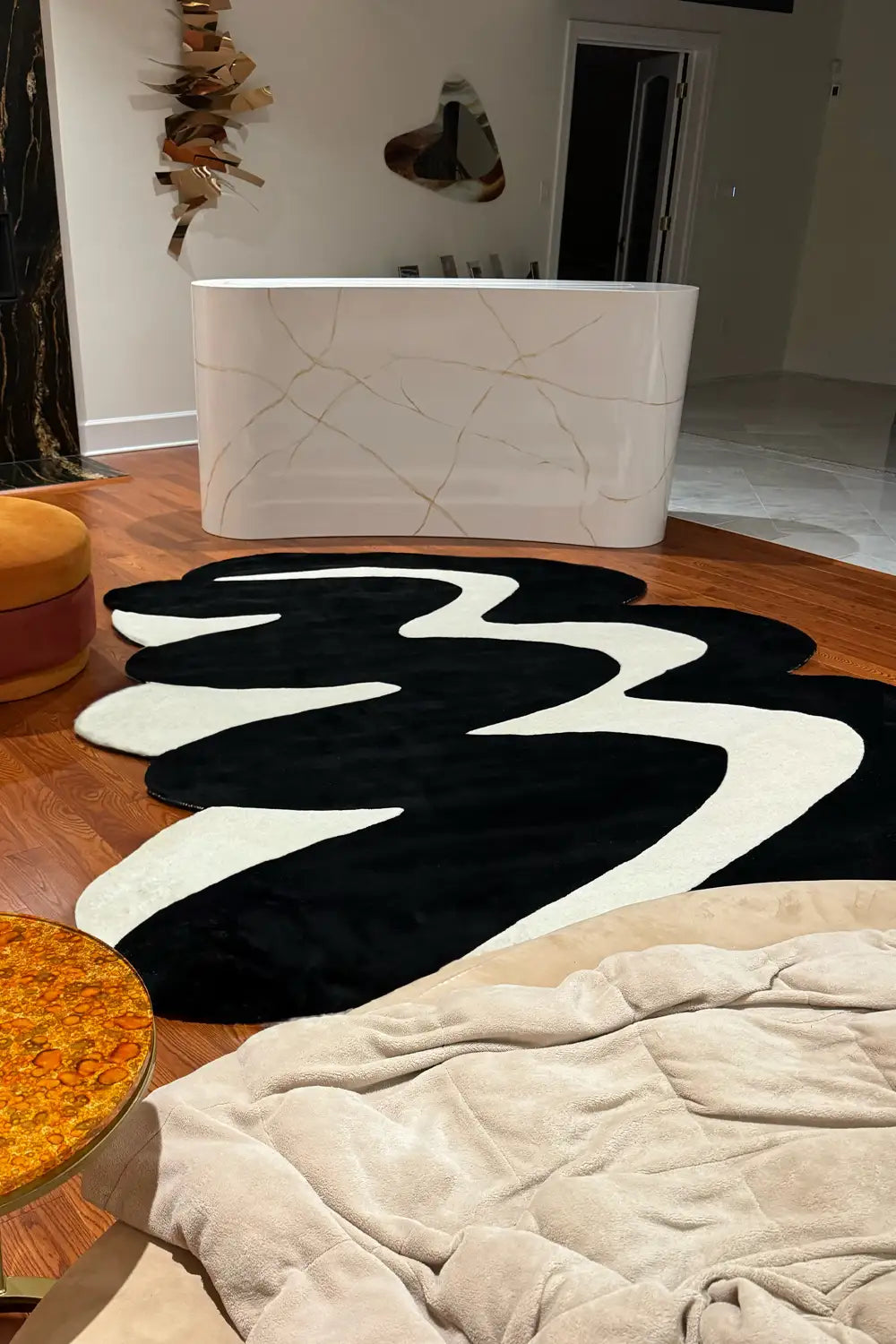Wavy Zig Zag Hand Tufted Rug in black and white with bold geometric patterns, perfect for modern living rooms lifestyle