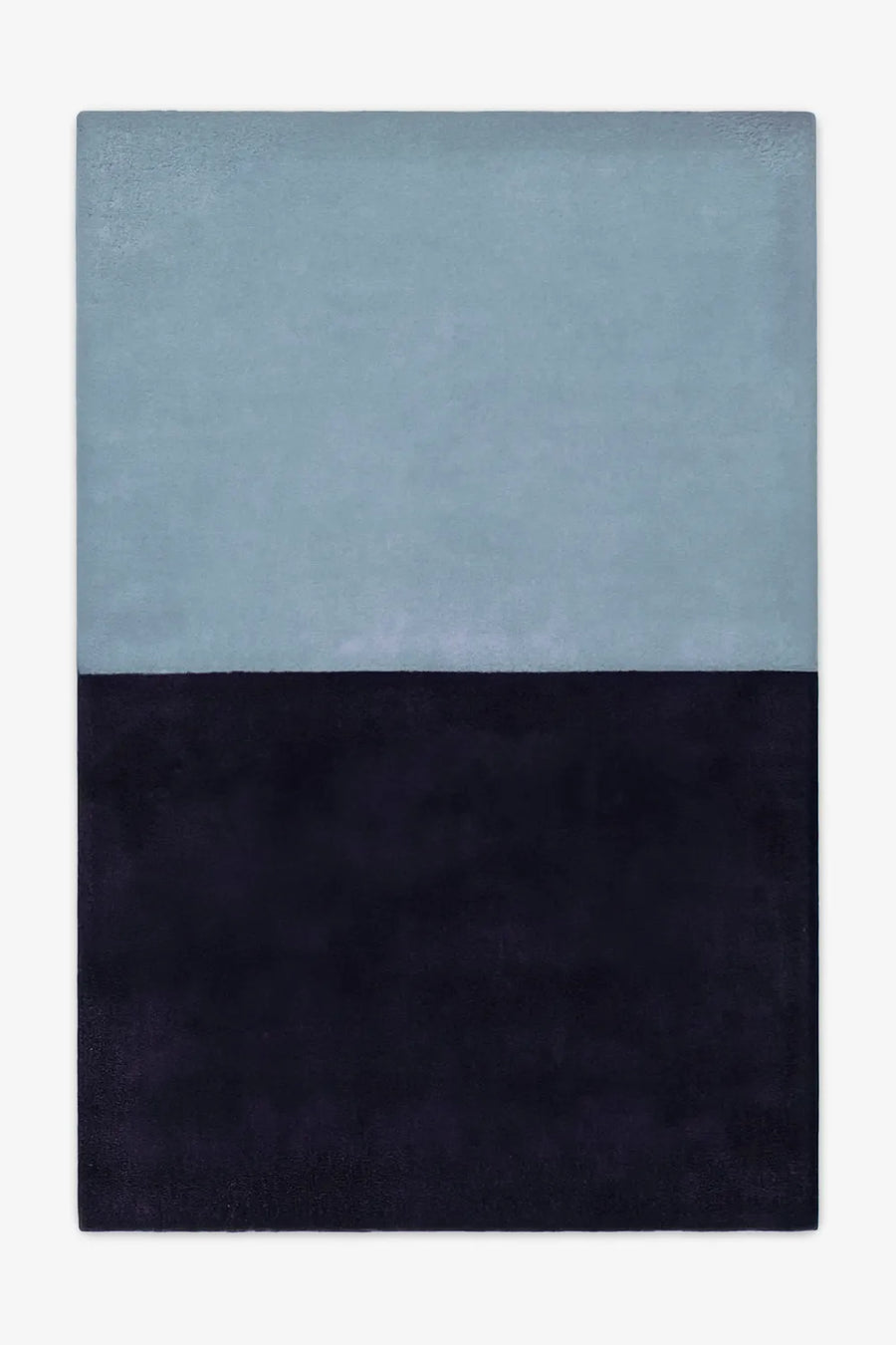5x8 two-tone wool area rug in light blue and deep navy, perfect for modern bedrooms, serene offices, or minimalist living rooms