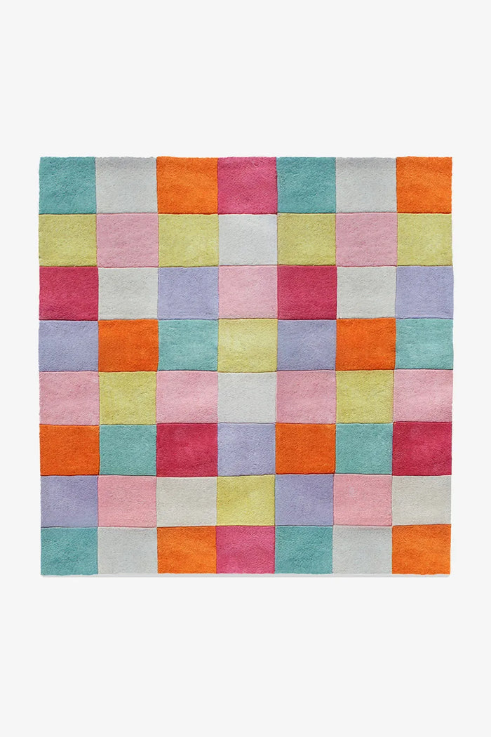 Colorful checkerboard square rug in playful modern design, perfect for 5x5 or 6x6 area rug sizes