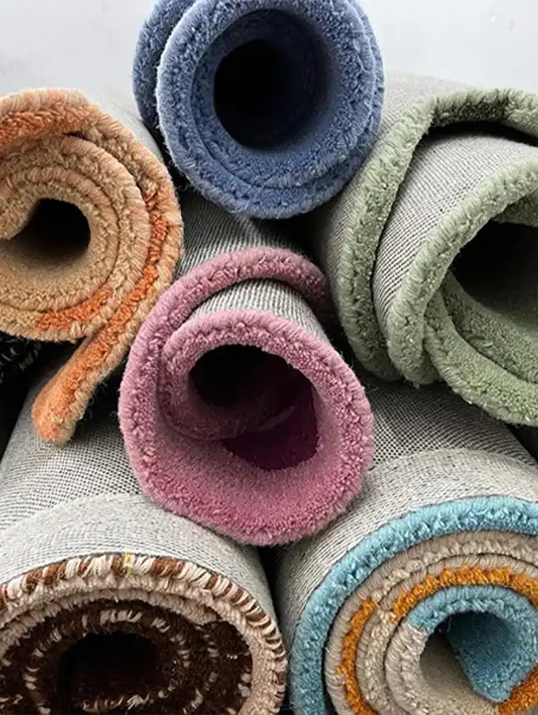 Finished wool area rugs in colorful modern patterns ready for shipping