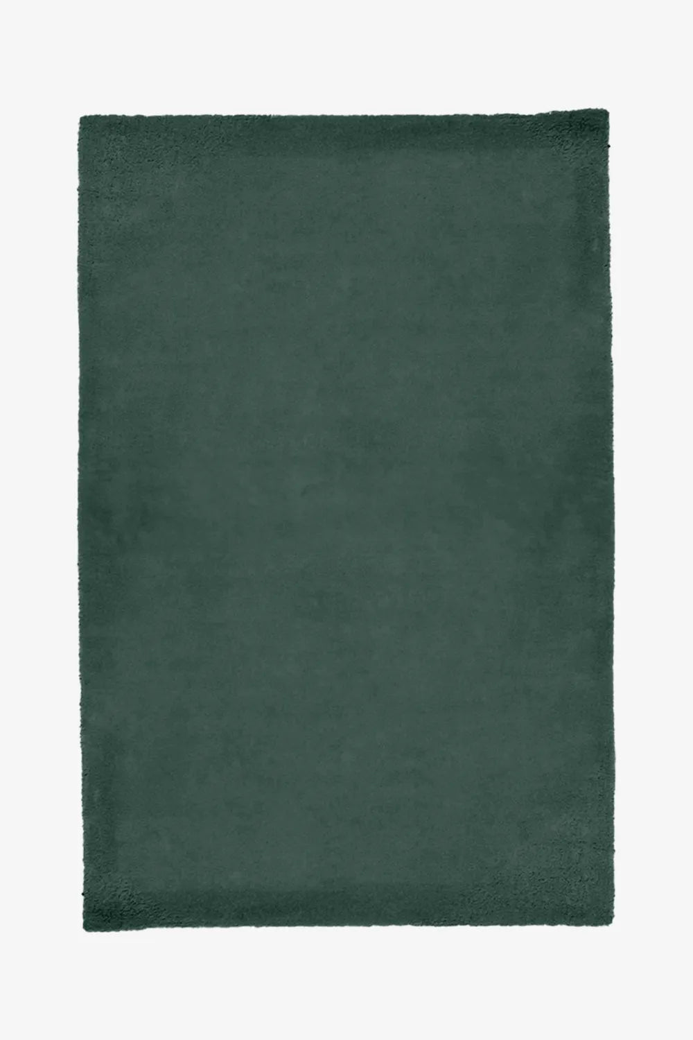 Dark green hand-tufted wool rug in a solid color, ideal as a Japandi or rustic rug for dining rooms