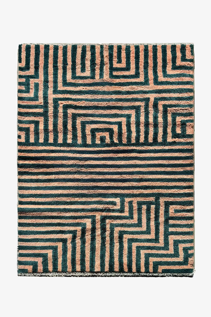5x8 modern peach and green shag rug with high-pile geometric maze pattern and bold block design