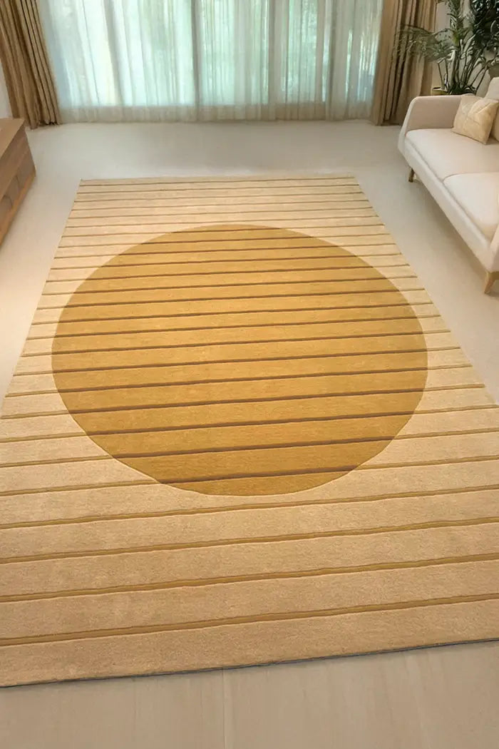 Cream and gold neutral wool rug with bold circle design, perfect as a Japandi rug for bedroom or calming spaces
