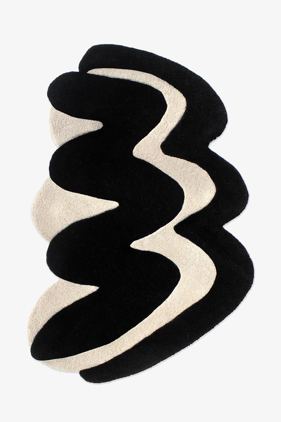 Modern black and cream sculptural wool rug with irregular wavy shape and bold abstract design