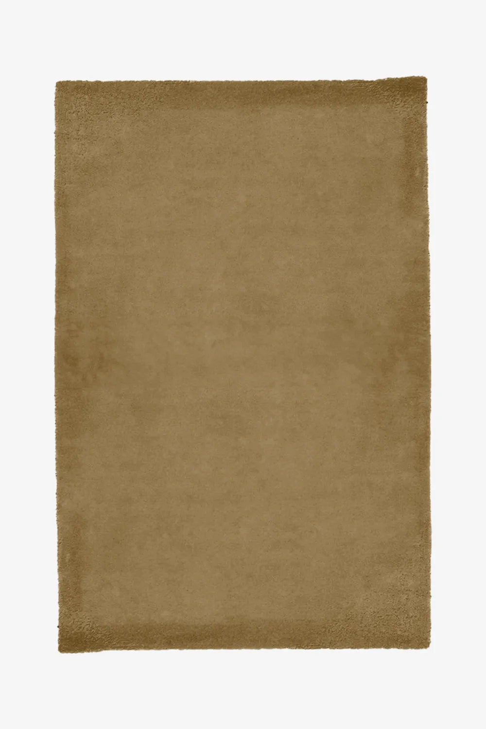 Tan wool rug in camel tone, hand-tufted and plush, great for mid century or boho living room designs