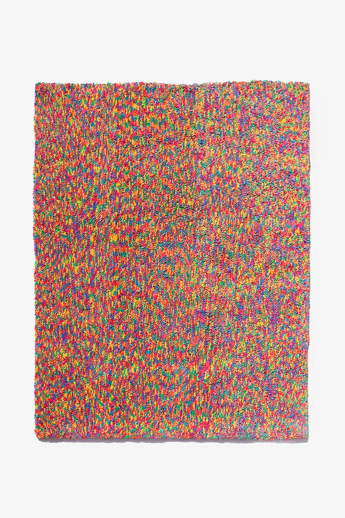 Multicolor recycled wool tufted rug with speckled texture, ideal for funky rugs, modern wool rugs, or sustainable area rugs for living rooms