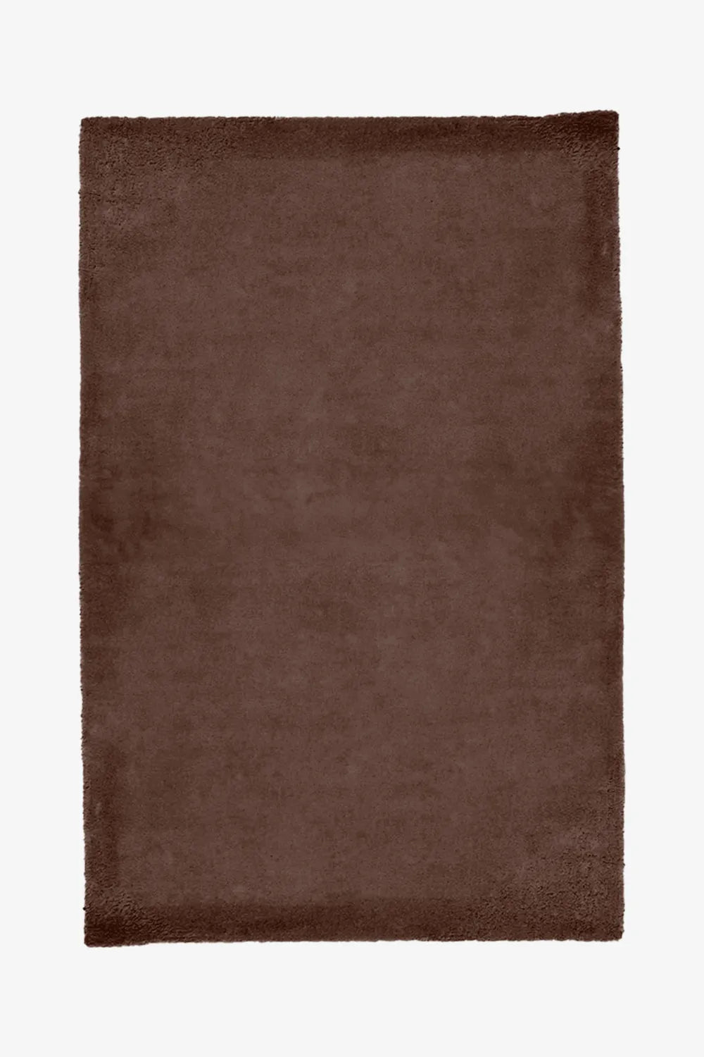 Solid chocolate brown wool rug with thick plush texture, ideal as a modern wool rug for cozy spaces