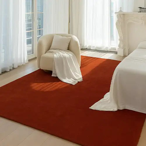Solid rust wool rug in a minimalist interior, great as a 5x8 rug, modern wool rug, or custom size rug for bedroom or office