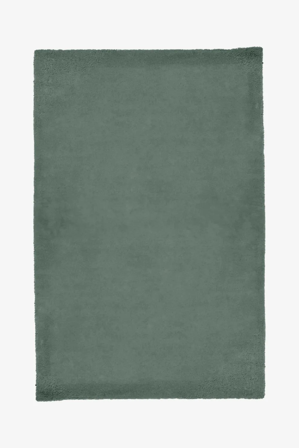 Solid olive green wool rug with dense texture, great for modern bedrooms or neutral-toned living spaces