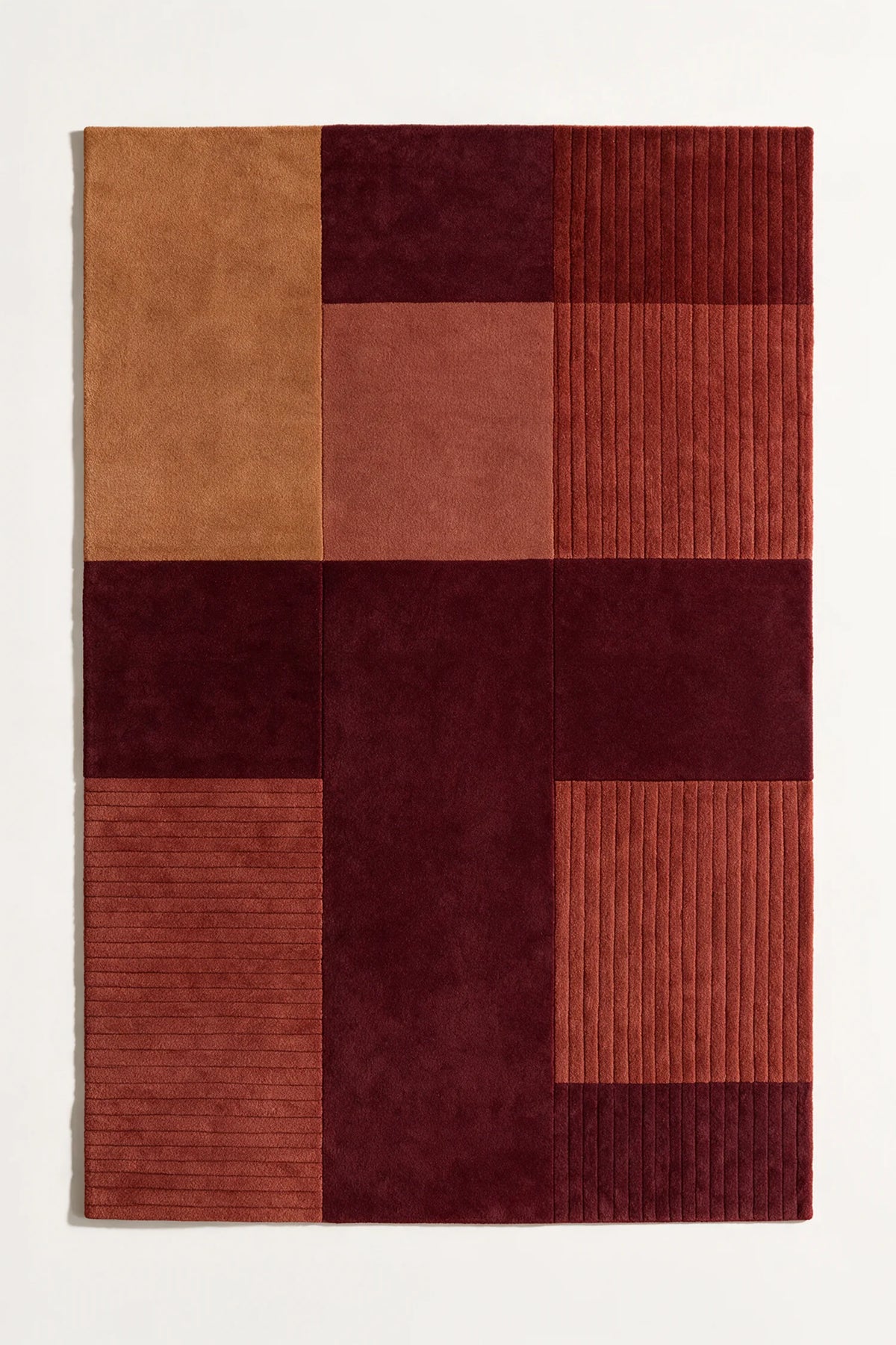 Burnt orange and deep red block pattern rug, boho modern wool rug for cozy living spaces and creative studios