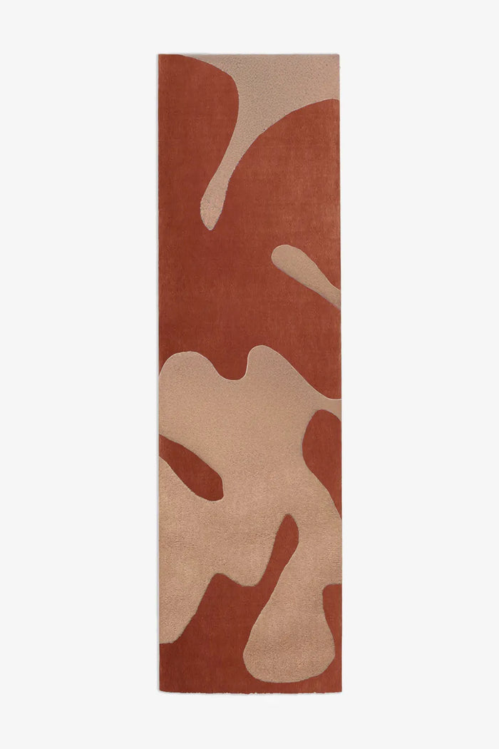 Modern 3x8 abstract runner rug in burnt orange rust and cream with bold organic abstract shapes terracotta