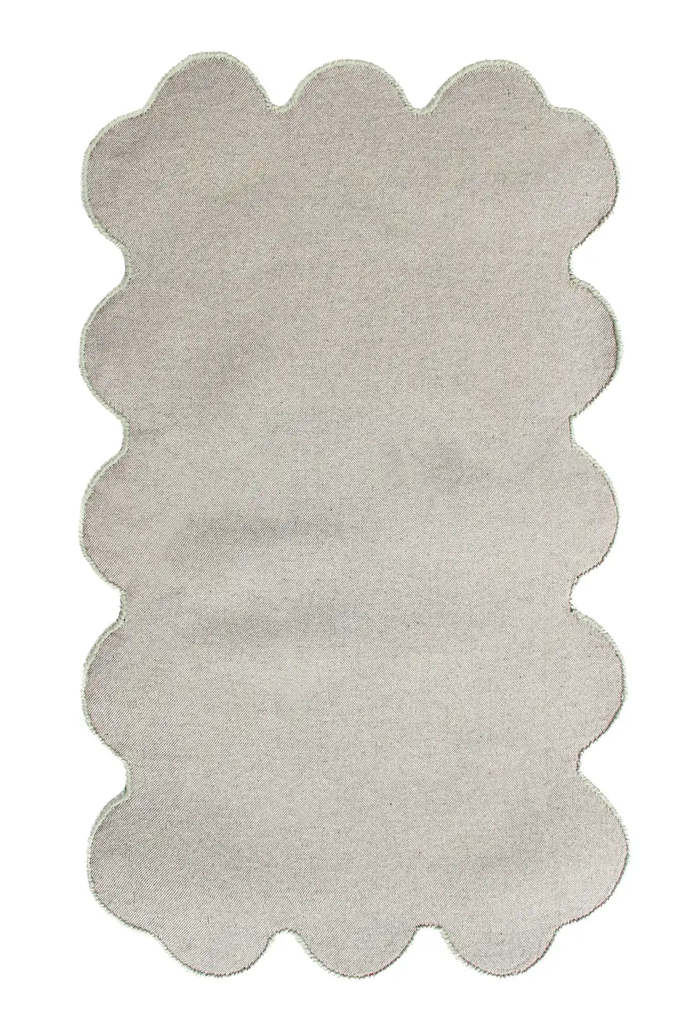 Back view showing the finishing around the unique sculpted edges of the Sculpted Edge Hand Tufted Wool Rug
