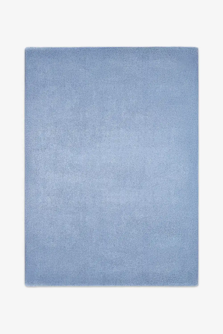Soft light blue wool area rug sized 6x9, a serene option for modern living rooms, bedrooms, or nursery designs