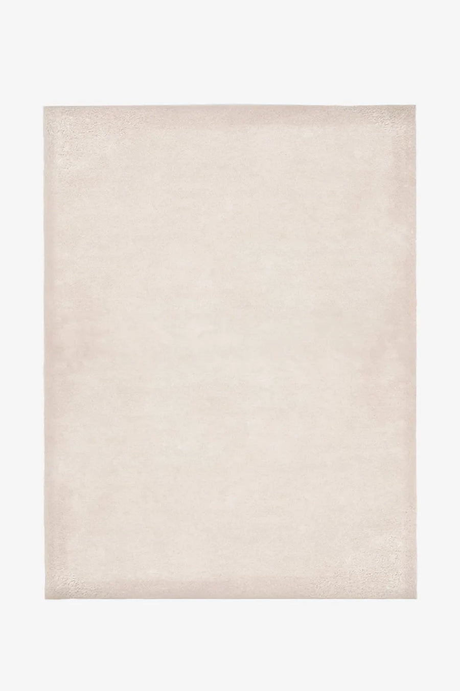 Off-white wool area rug sized 8x10, a timeless neutral rug for living rooms, bedrooms, or minimalist dining rooms