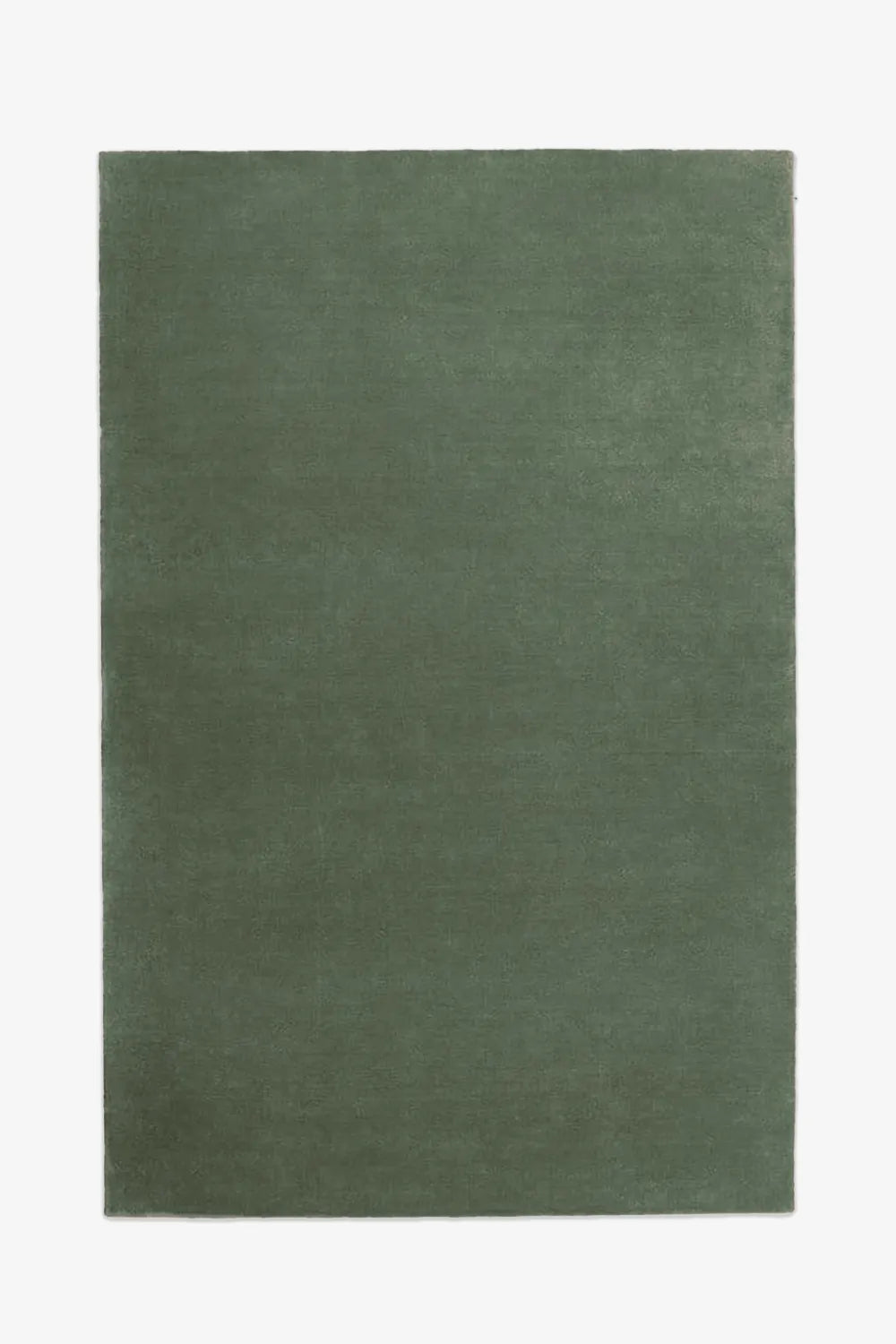 Forest green wool area rug in 8x10 size, a calming modern rug choice for bedrooms, dining rooms, and mid century interiors
