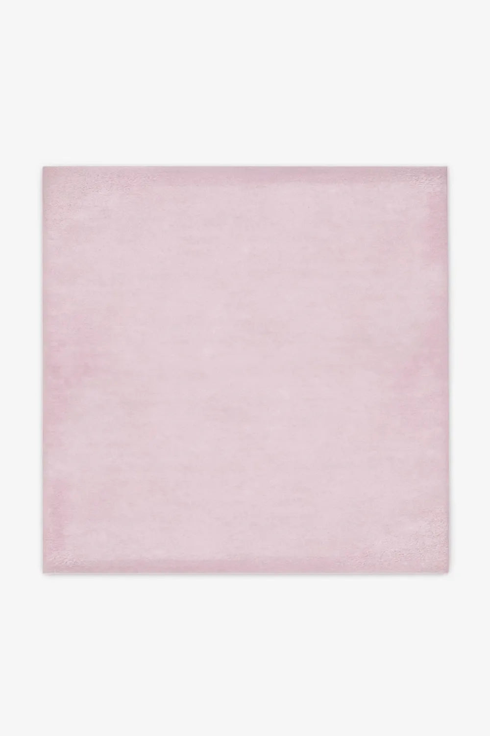 Blush pink wool square rug in 6x6 or 7x7 sizing, perfect for modern nursery designs or small square bedrooms