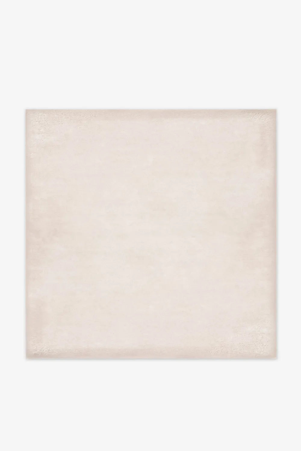 Cream wool square rug in 5x5 and 6x6 sizes, ideal for neutral rug lovers, entryway rugs, and minimalist home decor