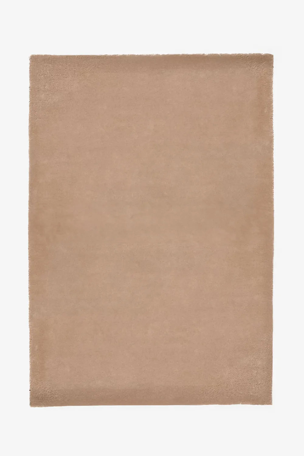Warm neutral tan wool area rug in 8x10 size, a versatile choice for minimalist homes, Japandi-inspired bedrooms, and modern living rooms