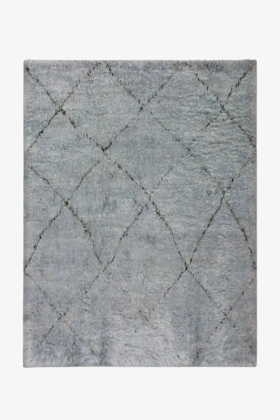 Light gray hand-knotted shag rug shown in 8x10 sizing, perfect for modern living rooms, cozy bedrooms, and luxury handmade interiors