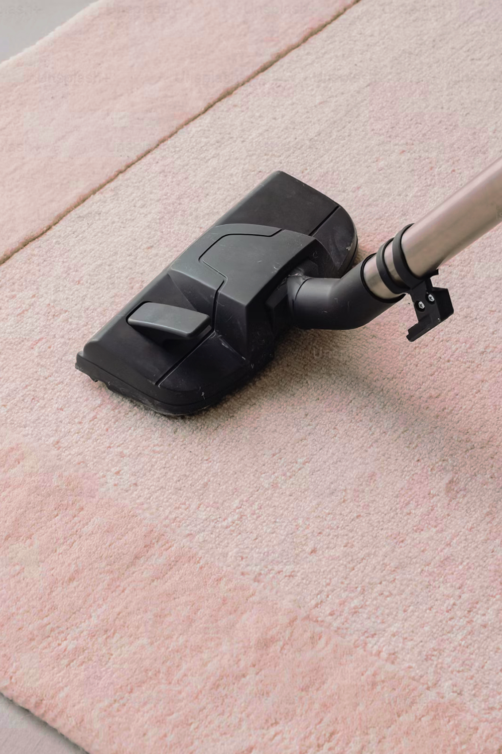 vacuuming a wool rug